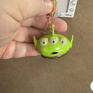 BaubleBar Green Alien Toy Story Bag Charm
